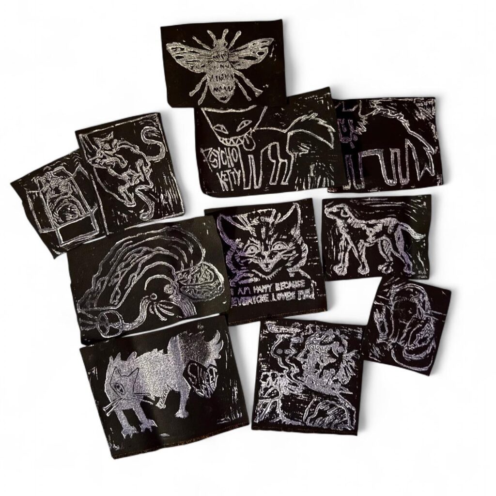 White ink, black fabric