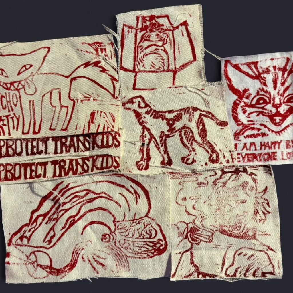 Red ink, cream/white fabric