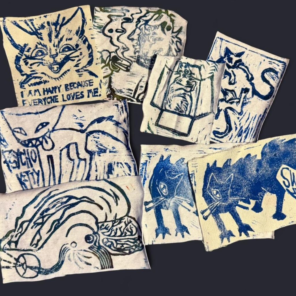 Blue ink, cream/white fabric