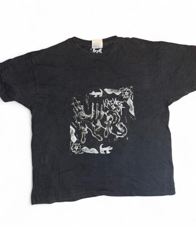 KNIVES OUT on black tee
