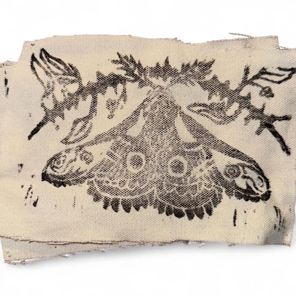Moth with brambles